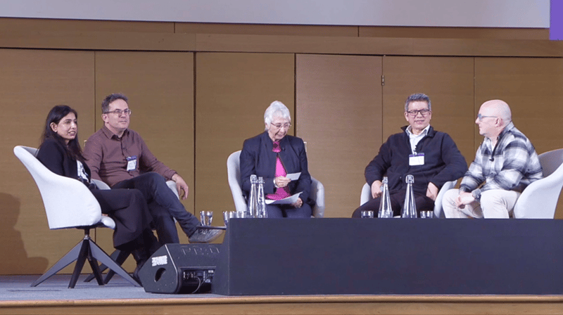 Panel discussion on peer review at Researcher to Reader Conference 2026, London. Speakers pictured: Jayne Marks, Ritu Dhand, Gareth Dyke, Stewart Manley, and Christopher Leonard.